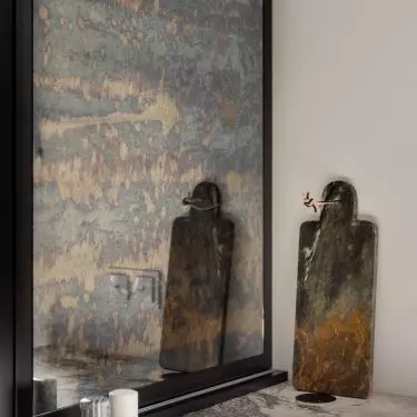 The illuminated bookcase was hidden behind the countertop