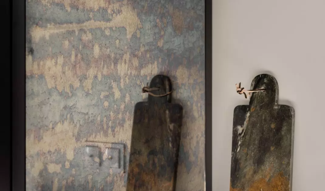 The illuminated bookcase was hidden behind the countertop