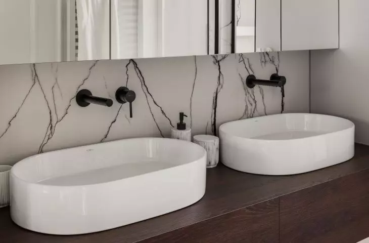 The bathroom has been divided into two zones