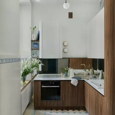 Furniture contrasts with bright tiles