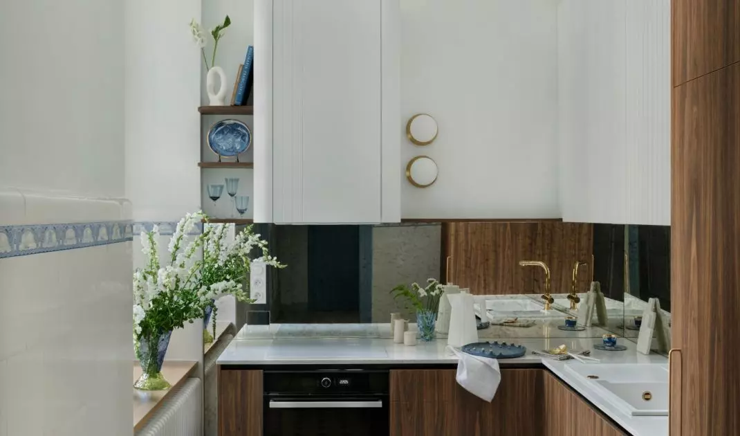 Furniture contrasts with bright tiles