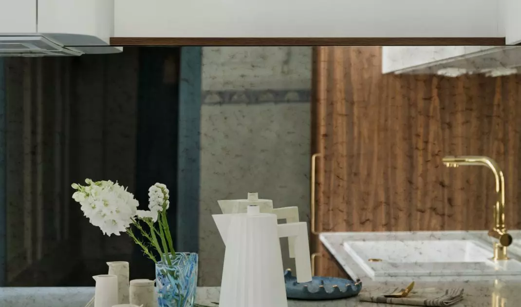 The kitchen furniture was made of dark veneer