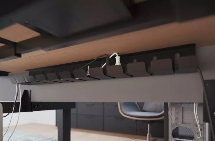 You can install a cable tray under the countertop
