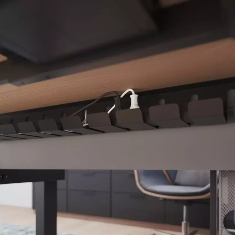 You can install a cable tray under the countertop