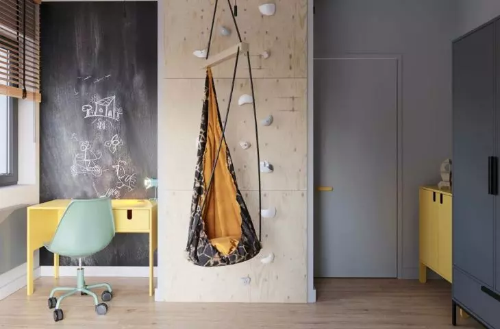 The wall above the desk has been turned into a blackboard