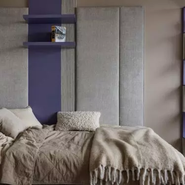 The division of the room into individual functional zones has been emphasized with upholstered panels 