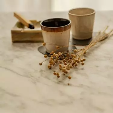 The marble coffee table was the starting point for creating the arrangement