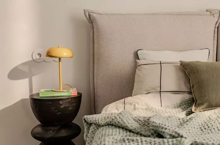 The bed headrest resembles large pillows