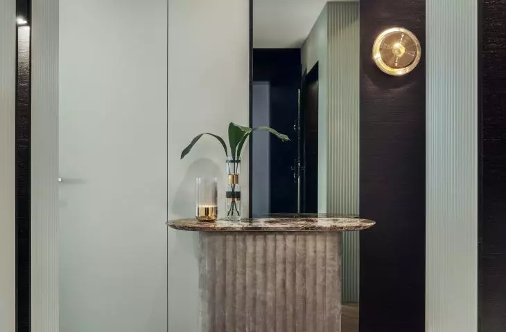 The console was created from a combination of stone and soft material