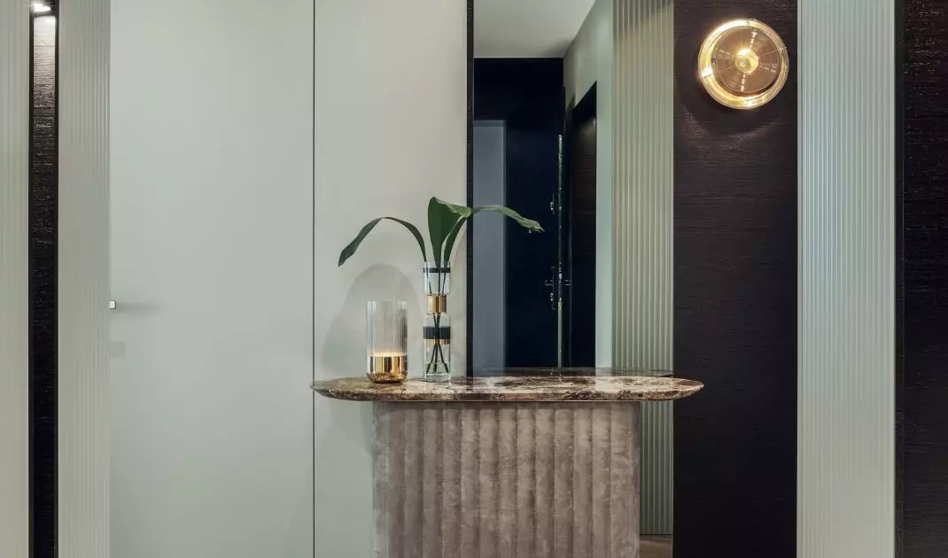 The console was created from a combination of stone and soft material