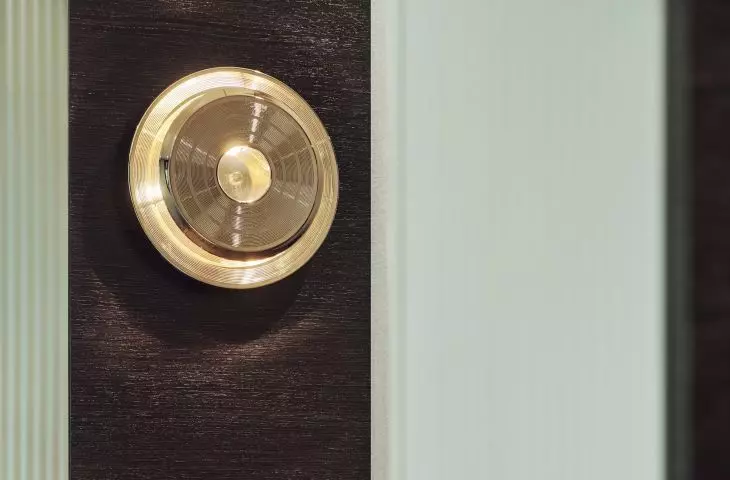 Gold wall lamp refers to the shape of a vinyl record player