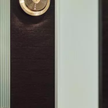 Gold wall lamp refers to the shape of a vinyl record player