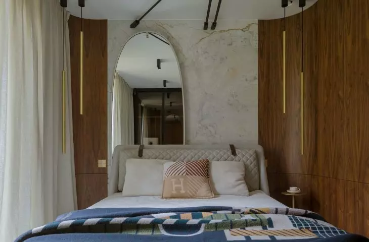 The semi-circular niches were lined with walnut-toned veneer