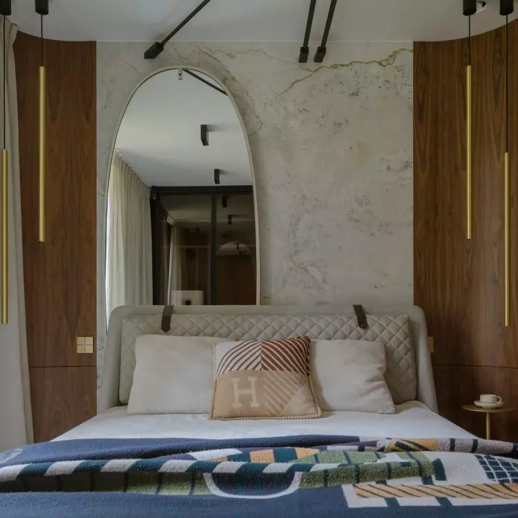 The semi-circular niches were lined with walnut-toned veneer
