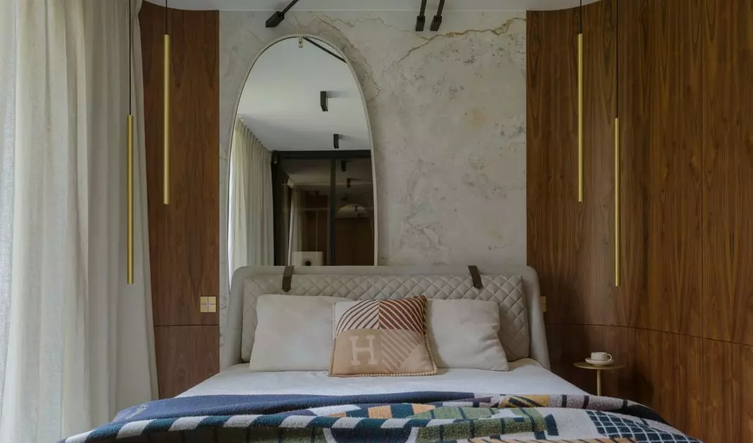 The semi-circular niches were lined with walnut-toned veneer