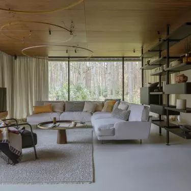 Glazed living room allows viewing of nature