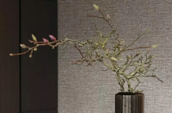 The kitchen island was made of dark marble