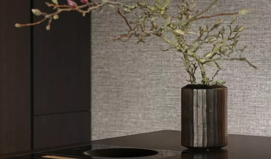 The kitchen island was made of dark marble