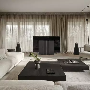 The corner sofa is complemented by two armchairs