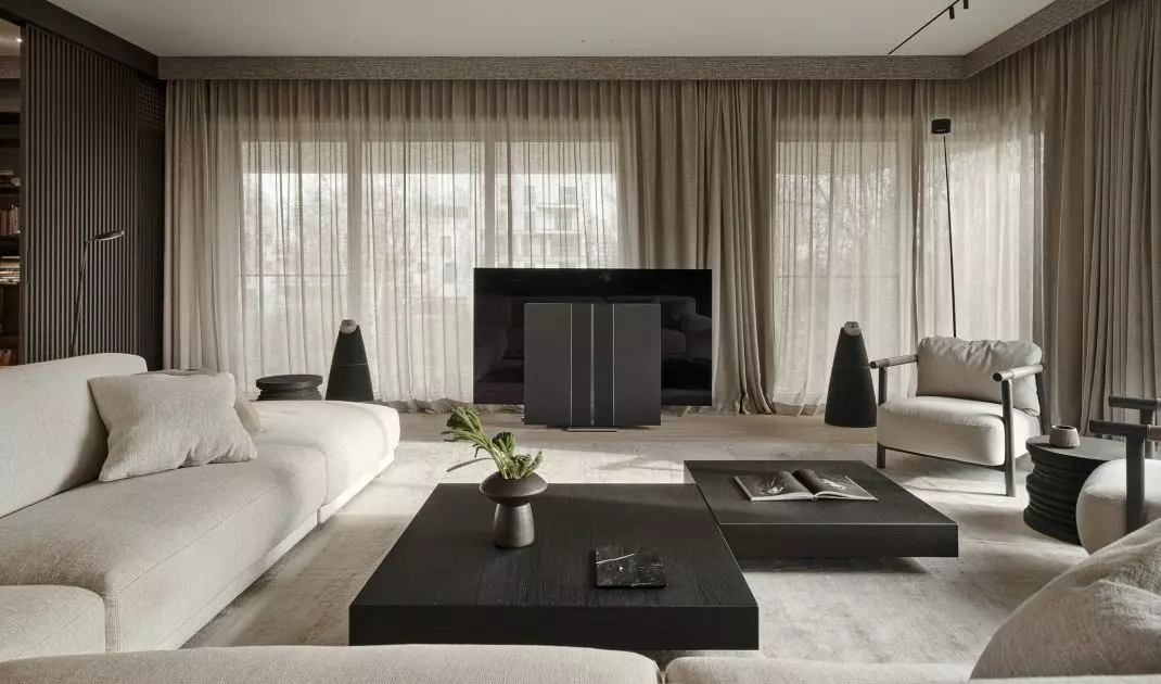 The corner sofa is complemented by two armchairs