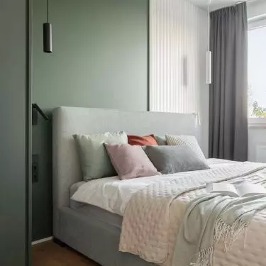 Next to the bed, the architects used decorative fixtures