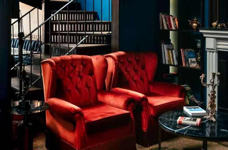 Dark Academia style interior is dominated by dark, deep colors