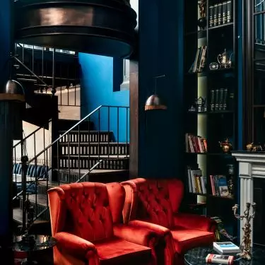 Dark Academia style interior is dominated by dark, deep colors