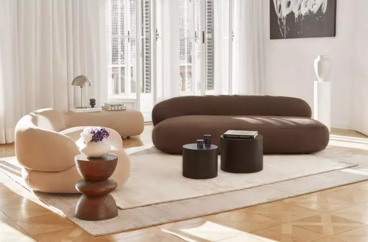 A chocolate sofa can be the focal point of an arrangement