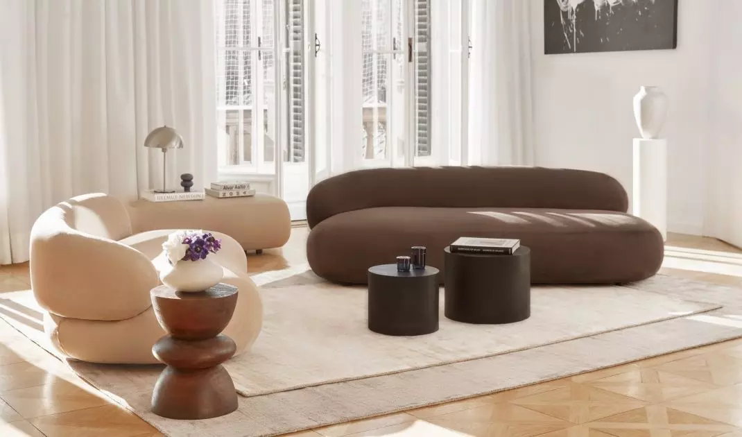 A chocolate sofa can be the focal point of an arrangement