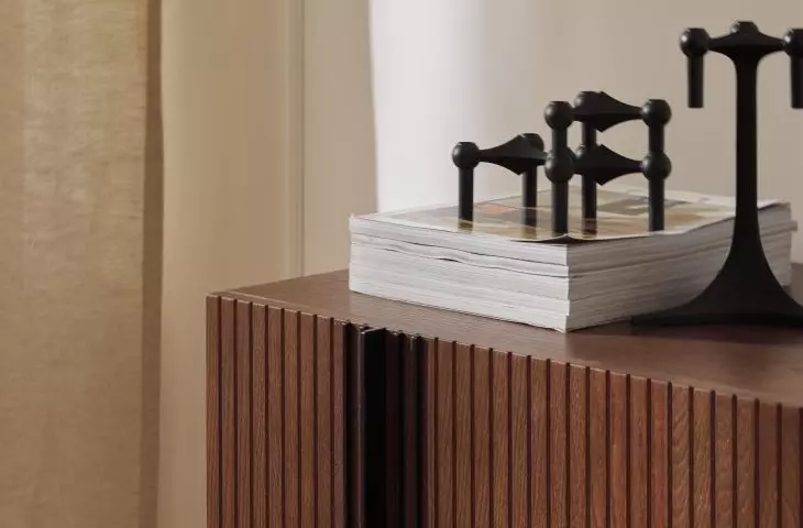 Wooden furniture goes well with metallic accessories, for example