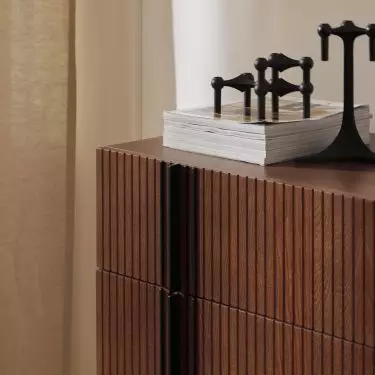 Wooden furniture goes well with metallic accessories, for example
