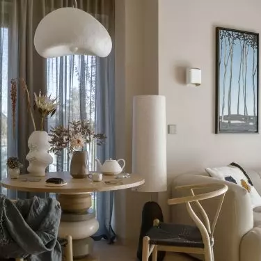 The pendant lamp over the table was handmade