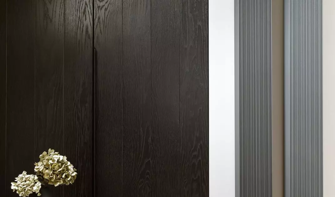 To take advantage of every inch, the interior features a lot of built-in furniture