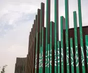 Detail of the facade with the flag of the Kingdom of Saudi Arabia