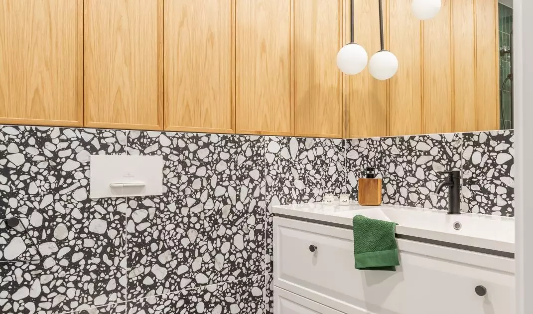Wooden elements balance patterned tiles