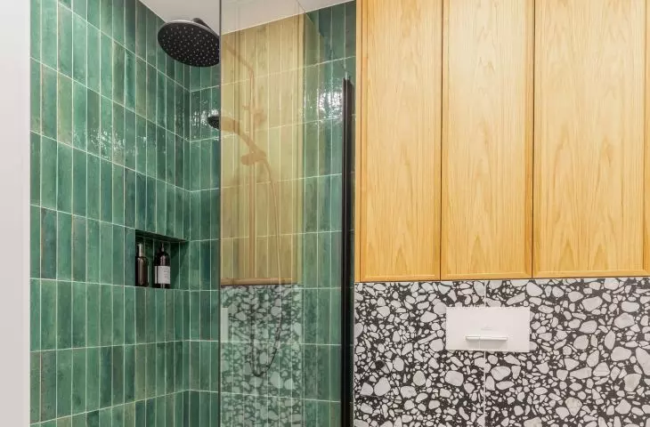 Tiles with terazzo pattern add dynamism to the interior