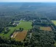 Aerial view of Buitenplaats Koningsweg surrounded by the Veluwe forest