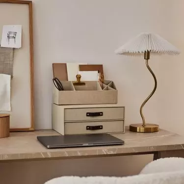 A stone tabletop and a dowdy chair will create an interesting contrast