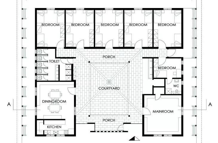Floor plan of girls' building with bedrooms, dining room, kitchen, main room, courtyard, porches, toilet and WC