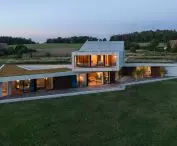 Loop house - view from the lake at dusk