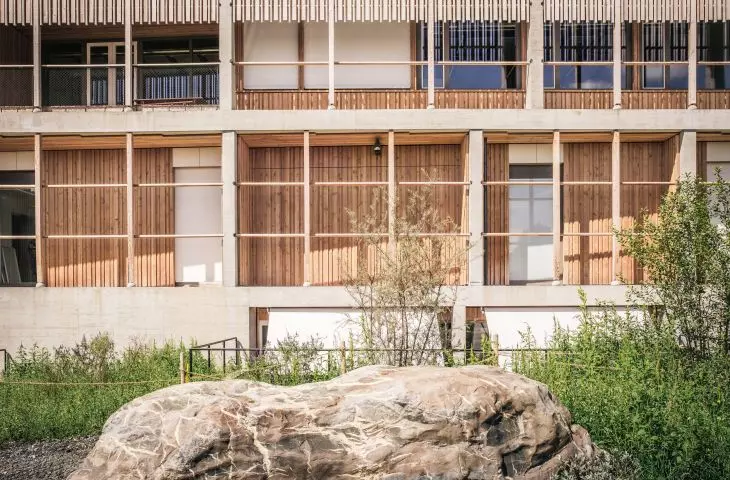 Modern building finished with wooden slats