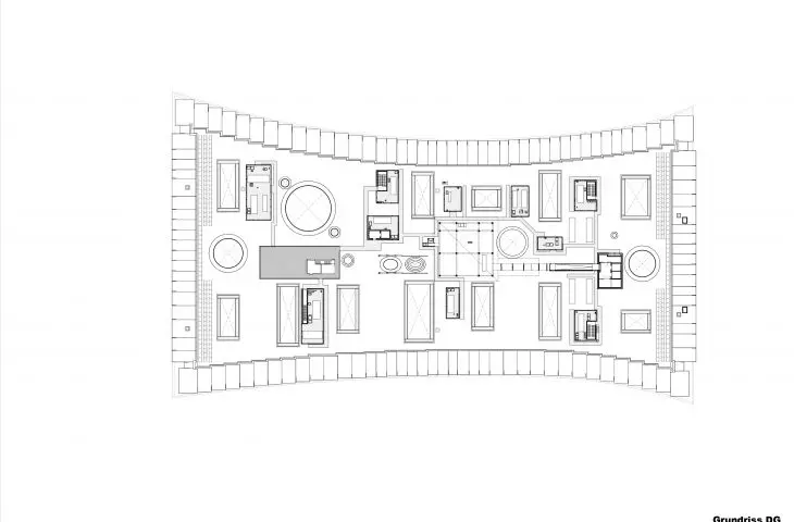  Floor plan with curved sides showing a series of rectangular rooms and circular elements