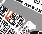 Mapa terenu z zaznaczonymi budynkami na czarno i z budynkiem Cuvry Campus zaznaczonym na czerwono