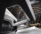 Inside the Zhuhai Art Center, there are numerous bridges and pillars, creating dynamic, multi-level arrangements.