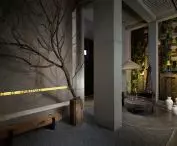 Stylish interior with a wooden bench decorated with a large branch