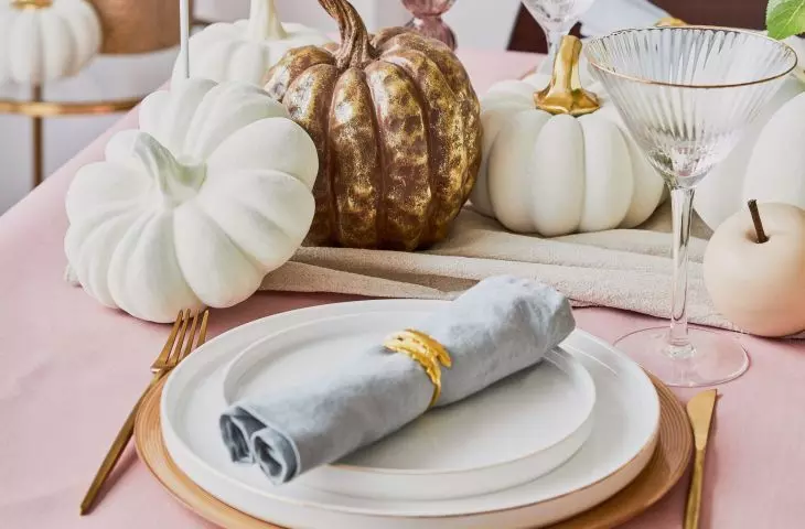 Gold accessories blend beautifully behind natural fabrics