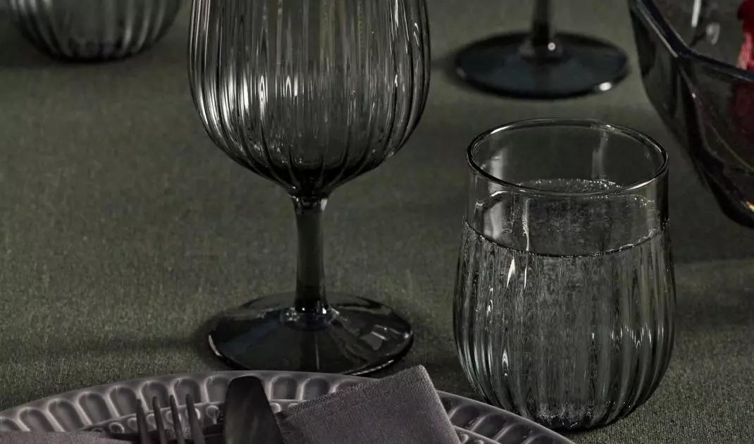Glasses and goblets in muted shades of graphite go beautifully with dark plates and textiles in similar tones