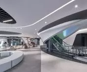 Museum of Robotics and Artificial Intelligence (RAIM) in Seoul - the centerpiece of the building is a vertical tunnel with escalators, leading visitors to the upper floors 