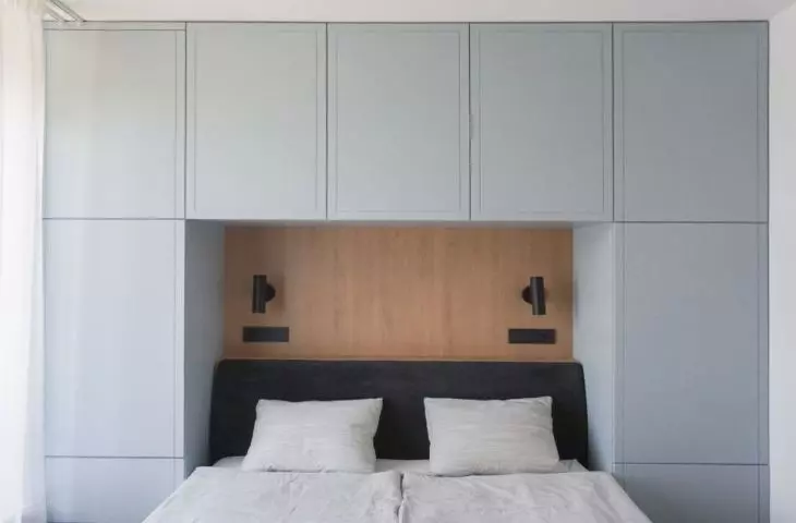 The space above the bed has been developed into a storage area