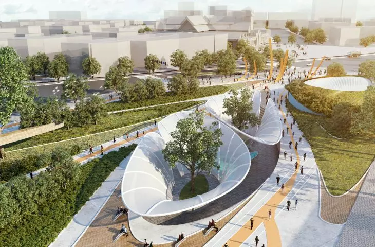 Widok z lotu ptaka na nowoczesny park z białymi konstrukcjami, zielenią i ścieżkami